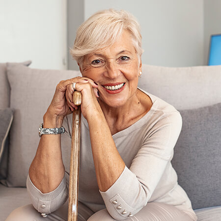 Smiling older woman with dentures
