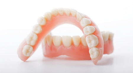 Full set of immediate dentures prior to placement
