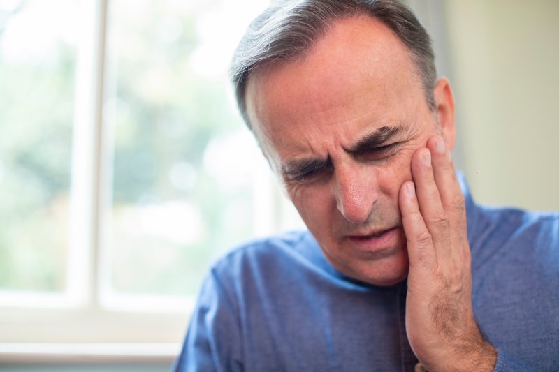 Man with tooth pain